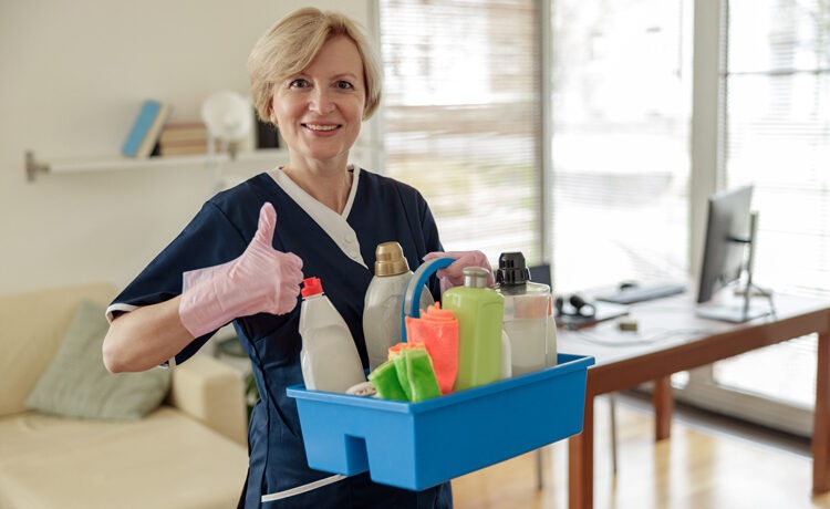A care giver helping with cleaning a home